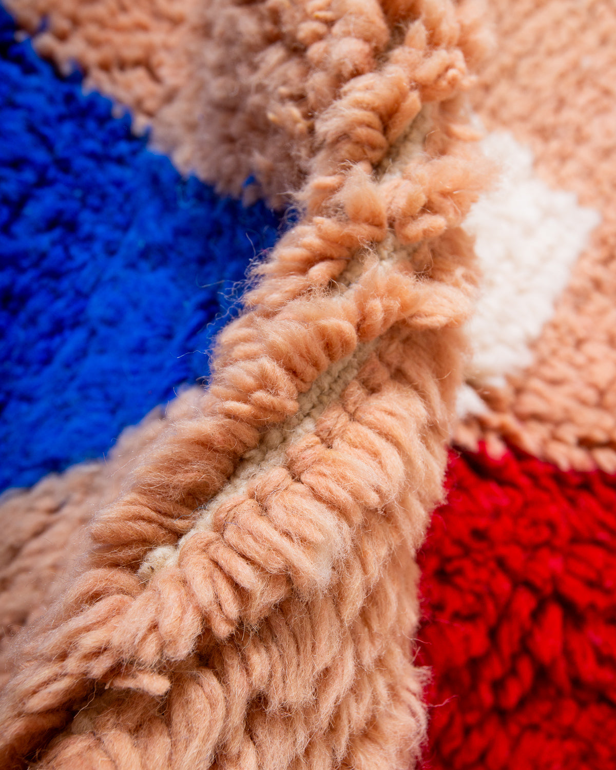 Modern, designer, handcrafted Berber rug from Morocco. Beniourain carpet with beautiful colours and patterns and fluffy wool texture.